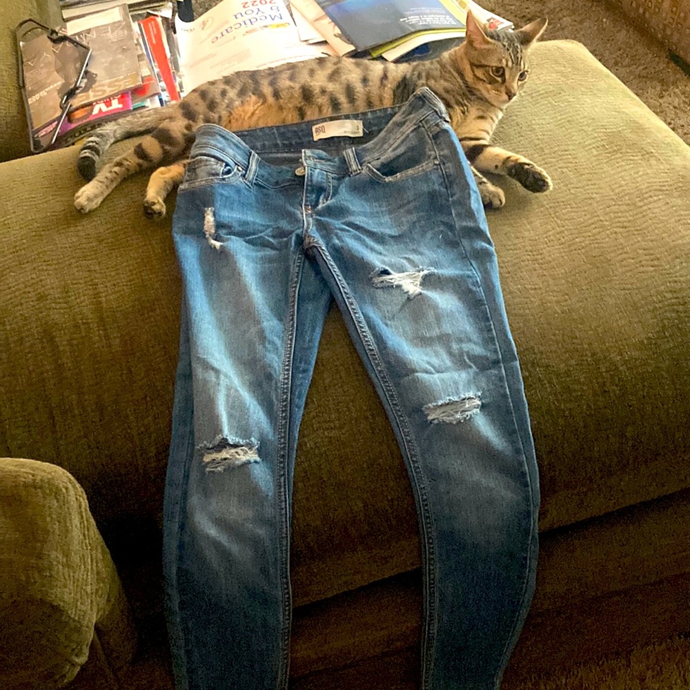 Selling these ripped blue jeans